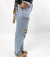 Mid rise jeans with rainbow rip