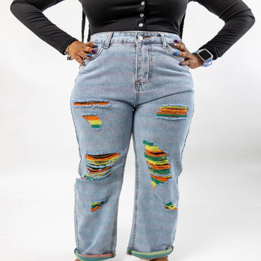 Mid rise jeans with rainbow rip